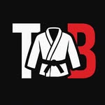 Tom Brennan Coaching logo, a gi and belt between the letters T and B.